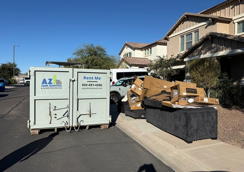 AZ junk truck and dumpster moving family luggage